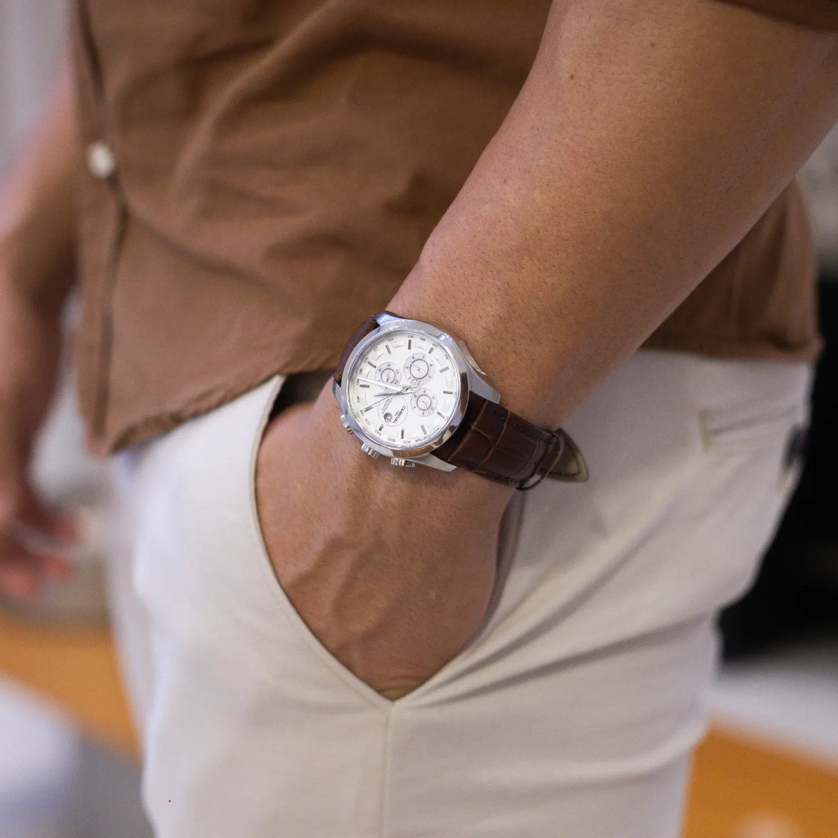 DALMONT Navigator chronograph watch on the wrist, hand resting in a pocket